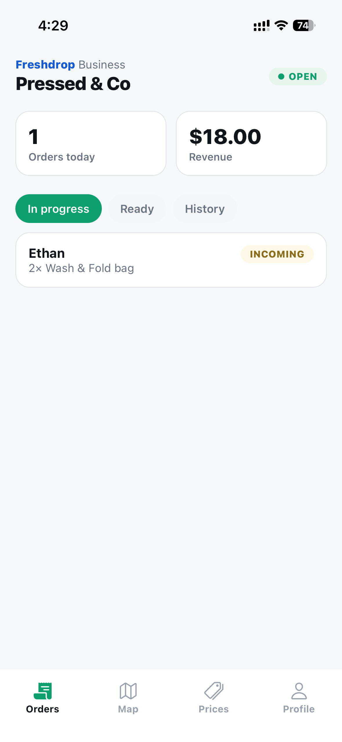 FreshDrop business screen for Pressed & Co: orders today, revenue, and an in-progress order queue with an incoming Wash & Fold order.